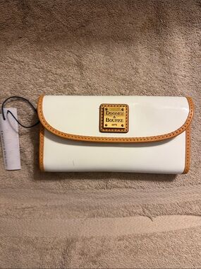 Dooney & Bourke Cream Wallet with Tan Trim and Logo Plaque